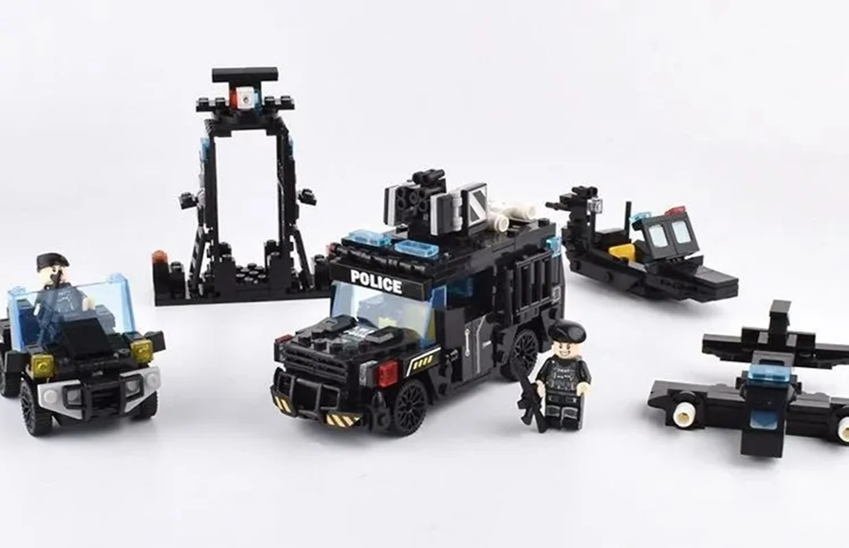 خرید لگو پلیس،لگو هواپیما، لگو ایست بازرسی، لگو جیپ و لگو هاورکرافت  لگو چائو بائو «ماشین پلیس»  Lego Chaobao S.W.A.T. Police Saber-Toothed Tiger Armored Car 7590