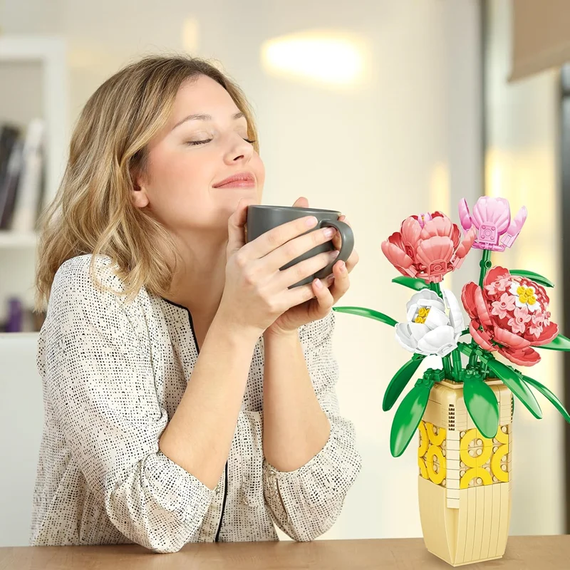 تصویر لگوی ساختهشده دسته گل Peony فلوور استودیو در گلدان